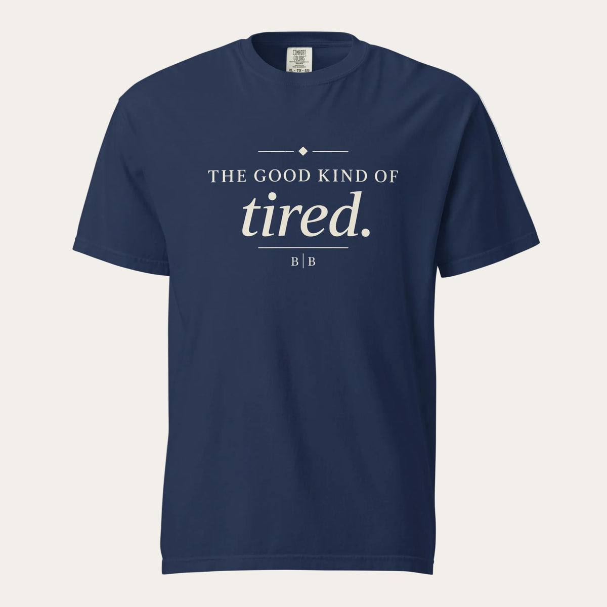 The Good Kind of Tired navy garment-dyed T-shirt front view